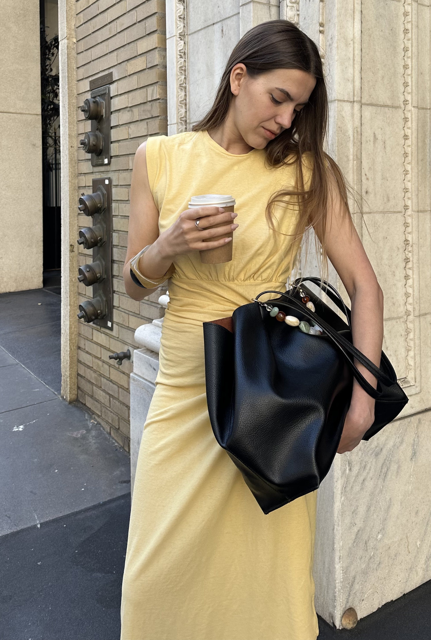 Minimalist flat lay UGC photography with handbag and planner